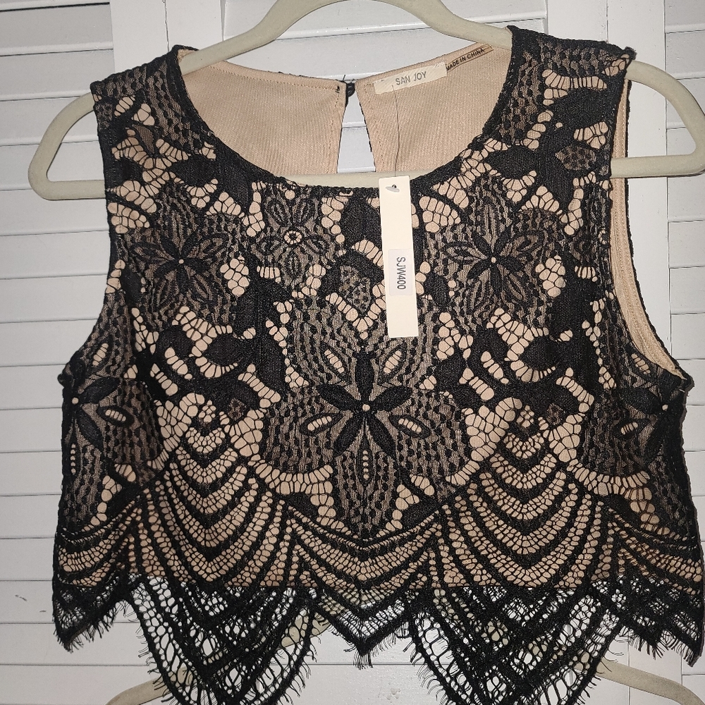 2 piece cocktail dress, eyelash lace draped over stretchy nude lining, side zip.